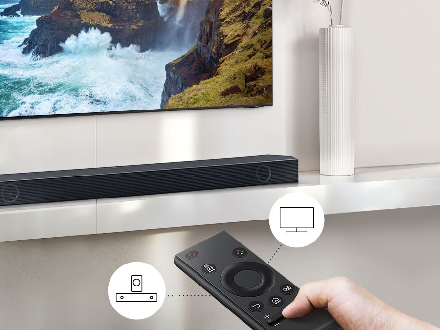 The user controls both Soundbar and TV functions with Samsung TV remote.