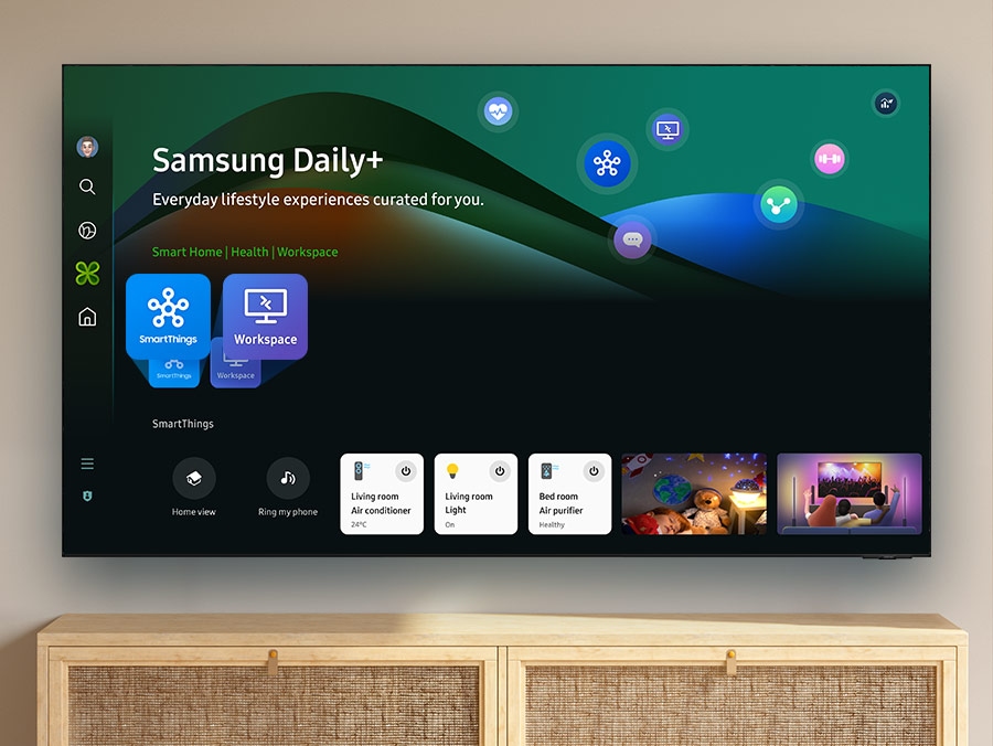 The TV displays the Samsung Daily+ menu with lifestyle apps like SmartThings and Workspace.