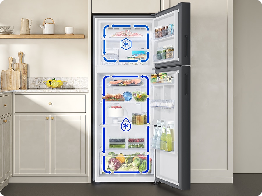 The door of the refrigerator is open. The arrows indicate that cold air is circulating in the top freezer and bottom fridge respectively.