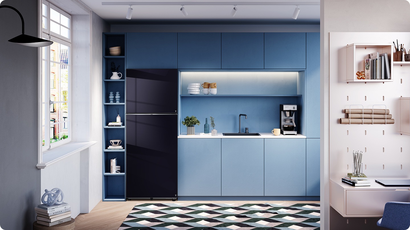 A Clean black refrigerator is installed in a modern kitchen.