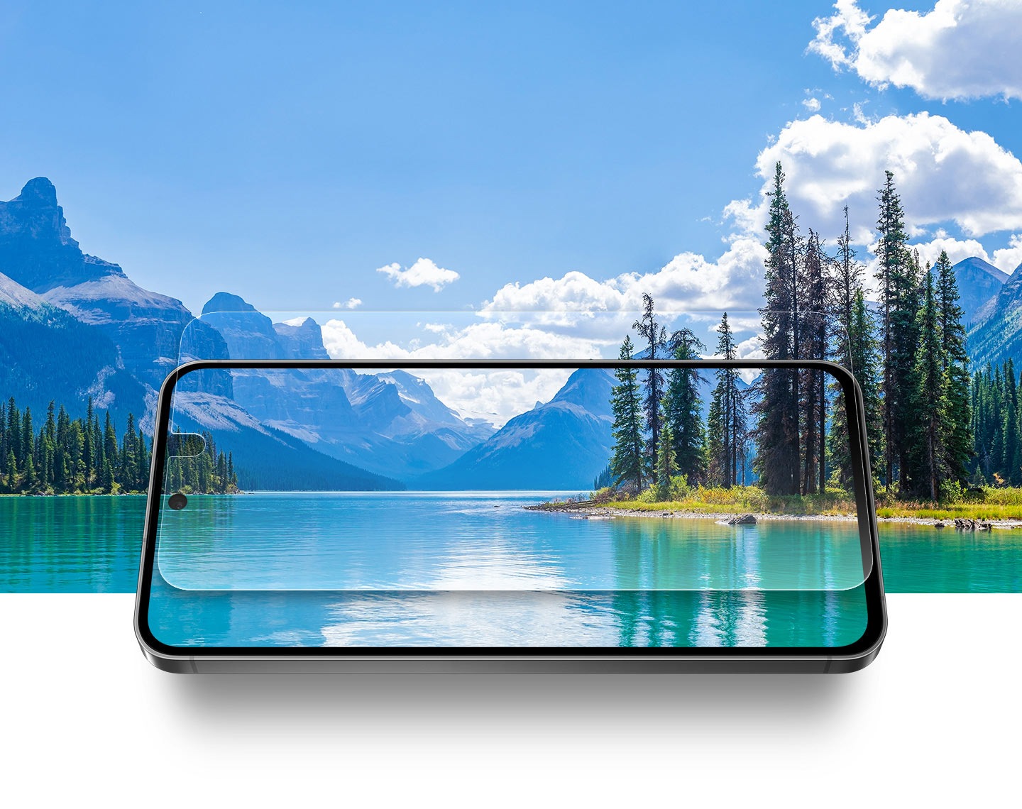 The Galaxy S24 FE with the Anti-Reflecting Film is placed over a sunny landscape of mountains, trees and a lake. The transparent screen showcases how the Anti-Reflecting Film on the display provides crystal-clear clarity and visibility.