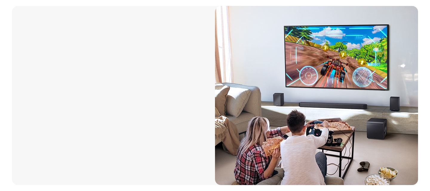 Two people enjoy an immersive 3D-like gaming experience with Game Pro mode on their Samsung soundbar.