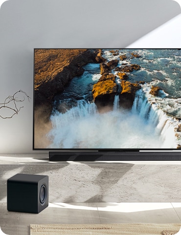 QS700F and subwoofer with TV.