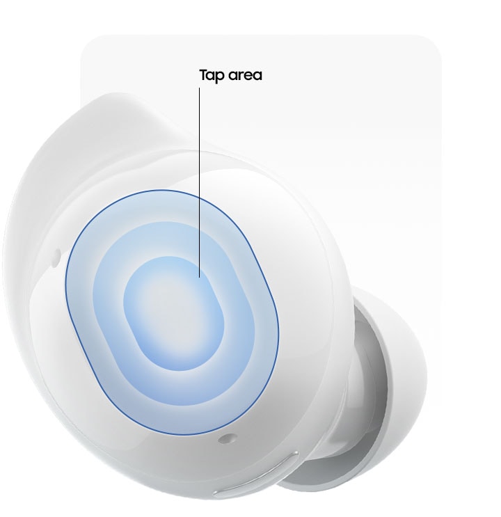 A single, white colored Galaxy Buds Core earbud with text Tap area indicating the center of the earbud to show where you should tap.