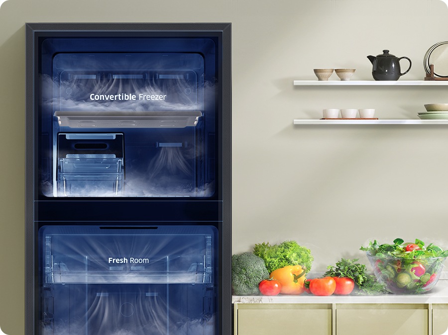 The inside of the refrigerator is visible and cold air spreads through every storage space.