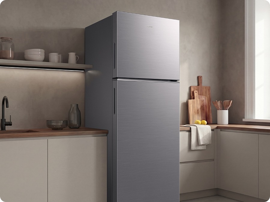 The sleek exterior of the refrigerator gives a clean look to the modern kitchen, with a flat finish.