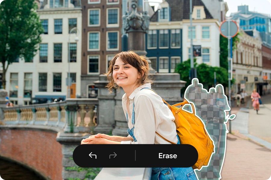A young woman leaning on a bridge over a city river with people and objects in the background selected to be erased using the Object Eraser feature on Galaxy A57 5G.