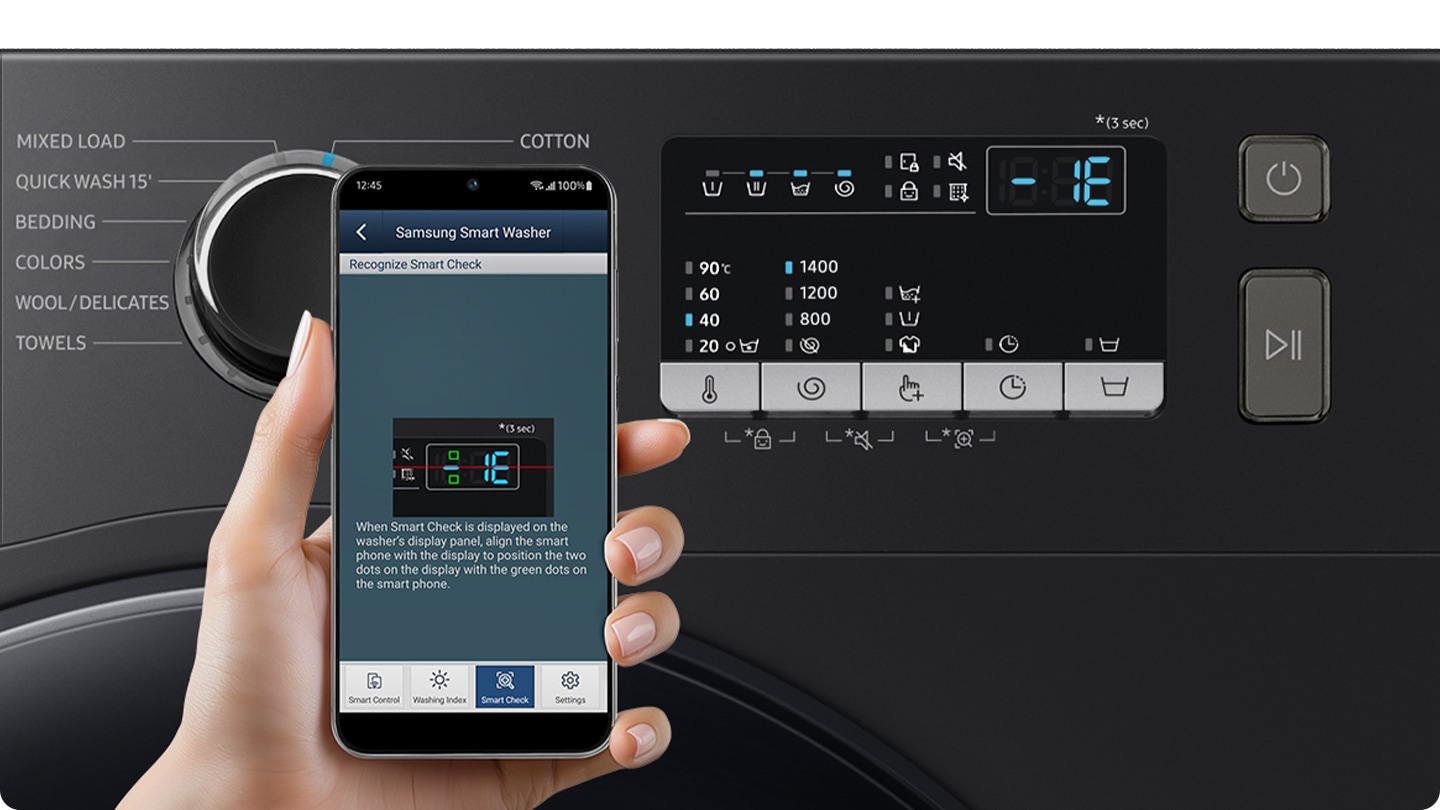 A person scans the error code that appeared on the washing machine display with the smartphone App.
