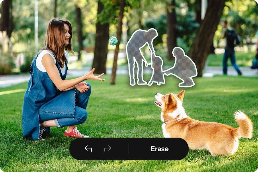 A woman and her dog playing in a park with people in the background cleanly removed using the Object Eraser feature on Galaxy A27 5G.