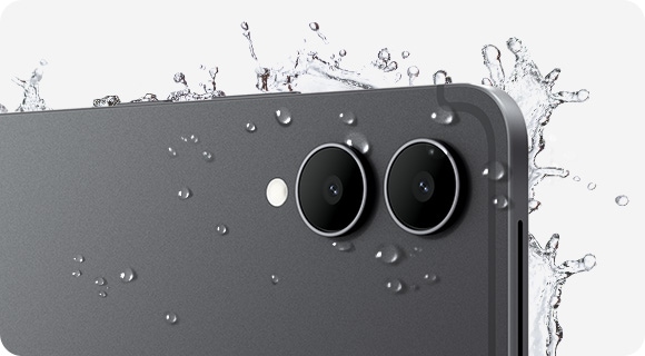 Close-up of the back of Galaxy Tab S12 Ultra with the rear cameras visible and splashes of water around the tablet, showcasing the IP68-rated protection against natural elements.
