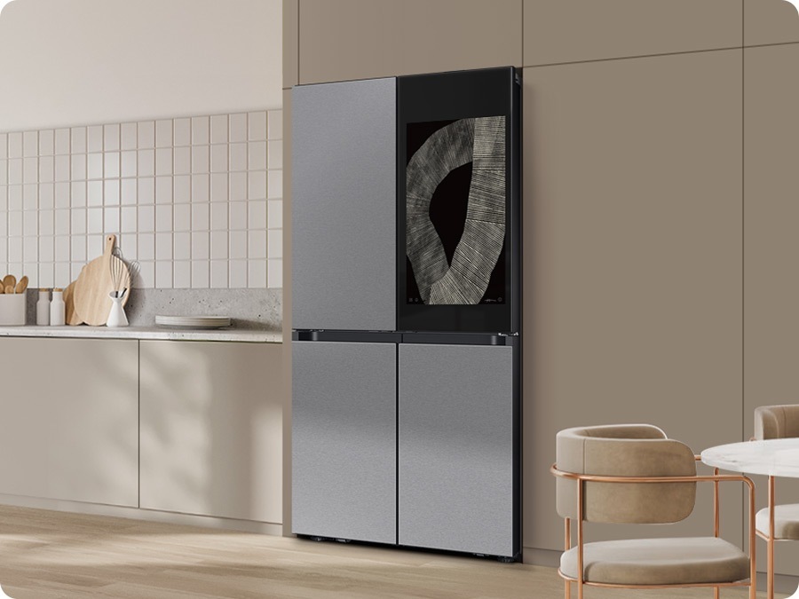 There is a Bespoke refrigerator with Family hub and Stainless Steel panels in a stylish kitchen.
