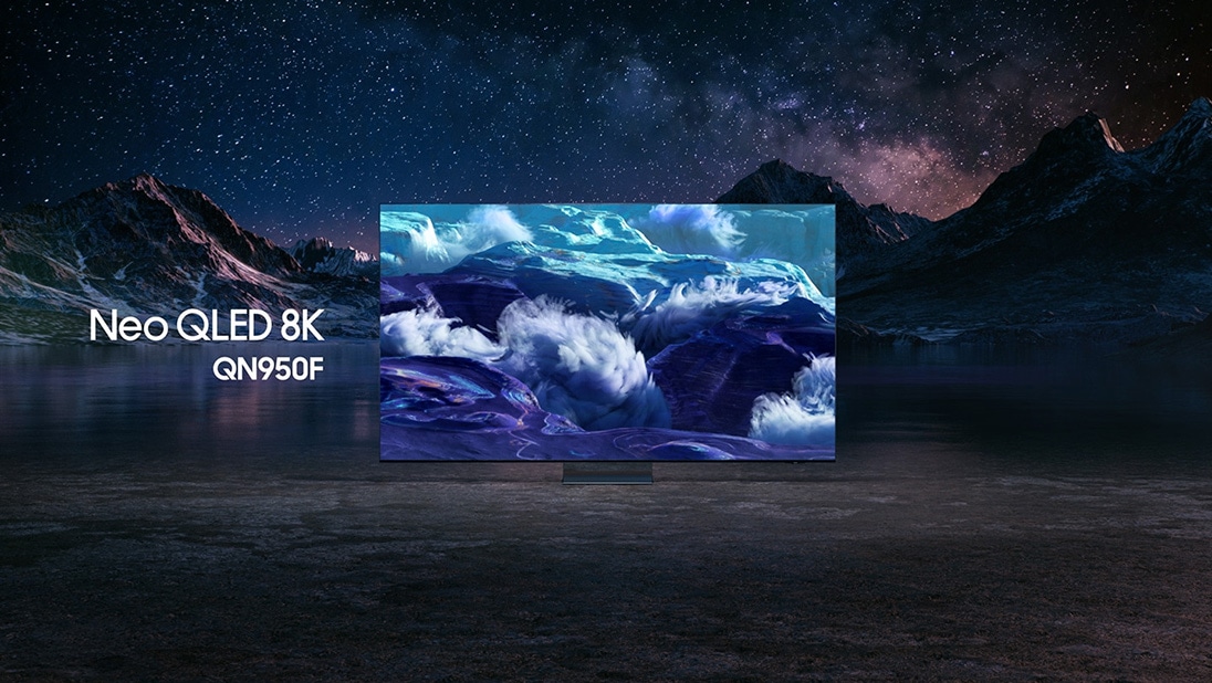 Samsung Neo QLED 8K QN950F TV against a mountain landscape at night displays a colorful scene of an otherworldly landscape.
