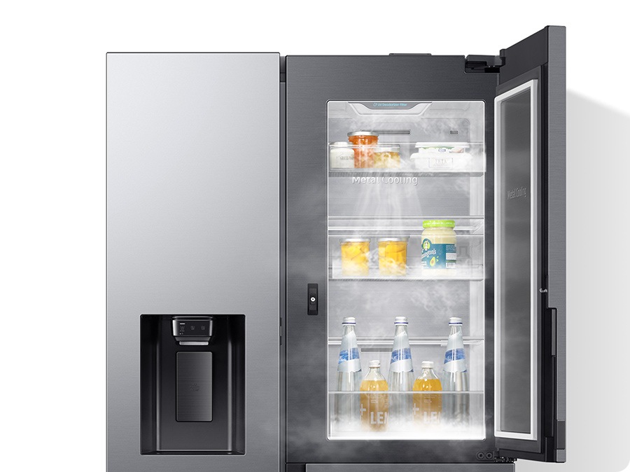 The upper right door of the 3-door fridge opens, and fresh cool air circulates around the compartment.