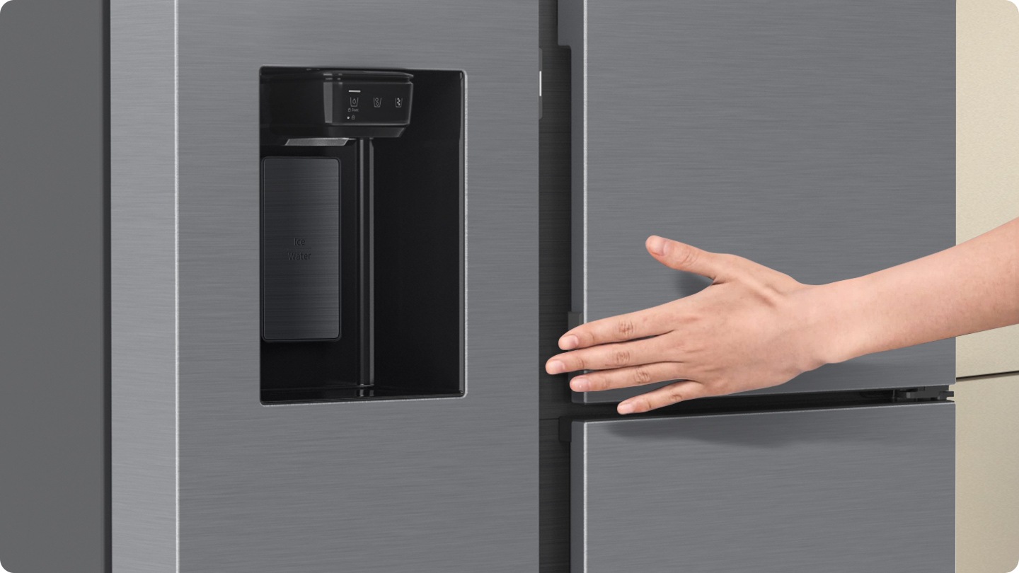 A hand slightly touches the Auto Open Door's touch sensor and the door automatically opens.