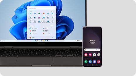 A graphite Galaxy Book3 360 is opened and facing forward with the MS Home Screen shown onscreen. A Galaxy S23 Plus device is placed in front of the laptop with the Home Screen shown onscreen.