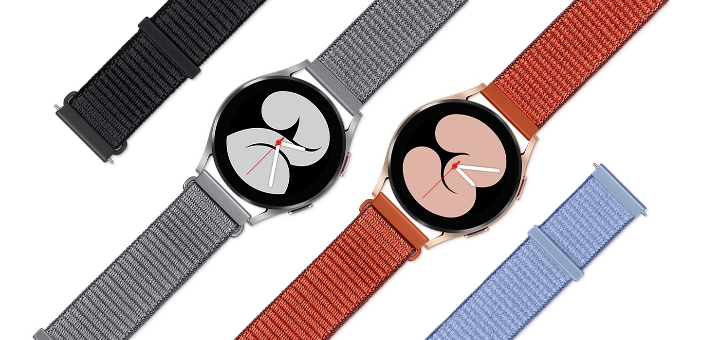 4 Galaxy Watch4 I cinturini in tessuto di diversi colori sono posizionati in diagonale. Sulla sinistra è parte di una fascia di tessuto nera. Il prossimo è un cinturino in tessuto grigio attaccato a un Galaxy Watch4 con un grande numero 2 grigio sul display. Il prossimo è un cinturino in tessuto rosso attaccato a un Galaxy Watch4 con un grande numero 3 rosa sul display. All'estrema destra c'è una parte del cinturino in tessuto azzurro.
