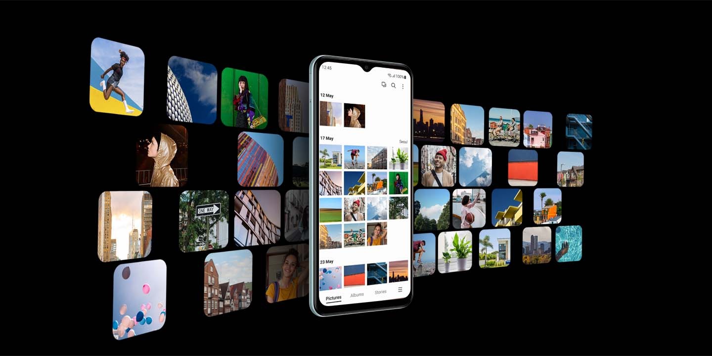 Galaxy M23 5G with the Gallery app onscreen is in the center. Numerous images are spread out in the background, representing that users can store their images and videos in Galaxy M23's spacious storage.