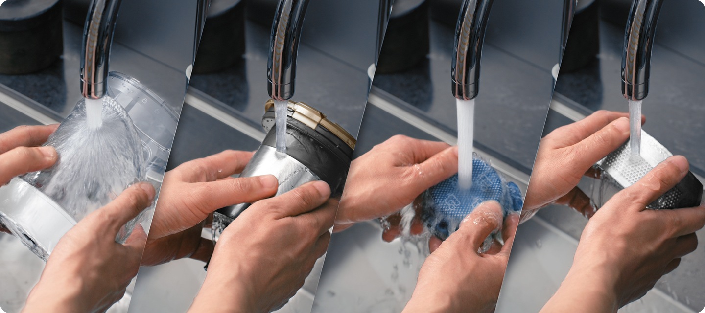 Le 4 parti della pattumiera di un JET su misura vengono lavate a mano sotto l'acqua corrente. Le 4 parti sono la pattumiera, il ciclone, il microfiltro e il filtro per polveri fini.