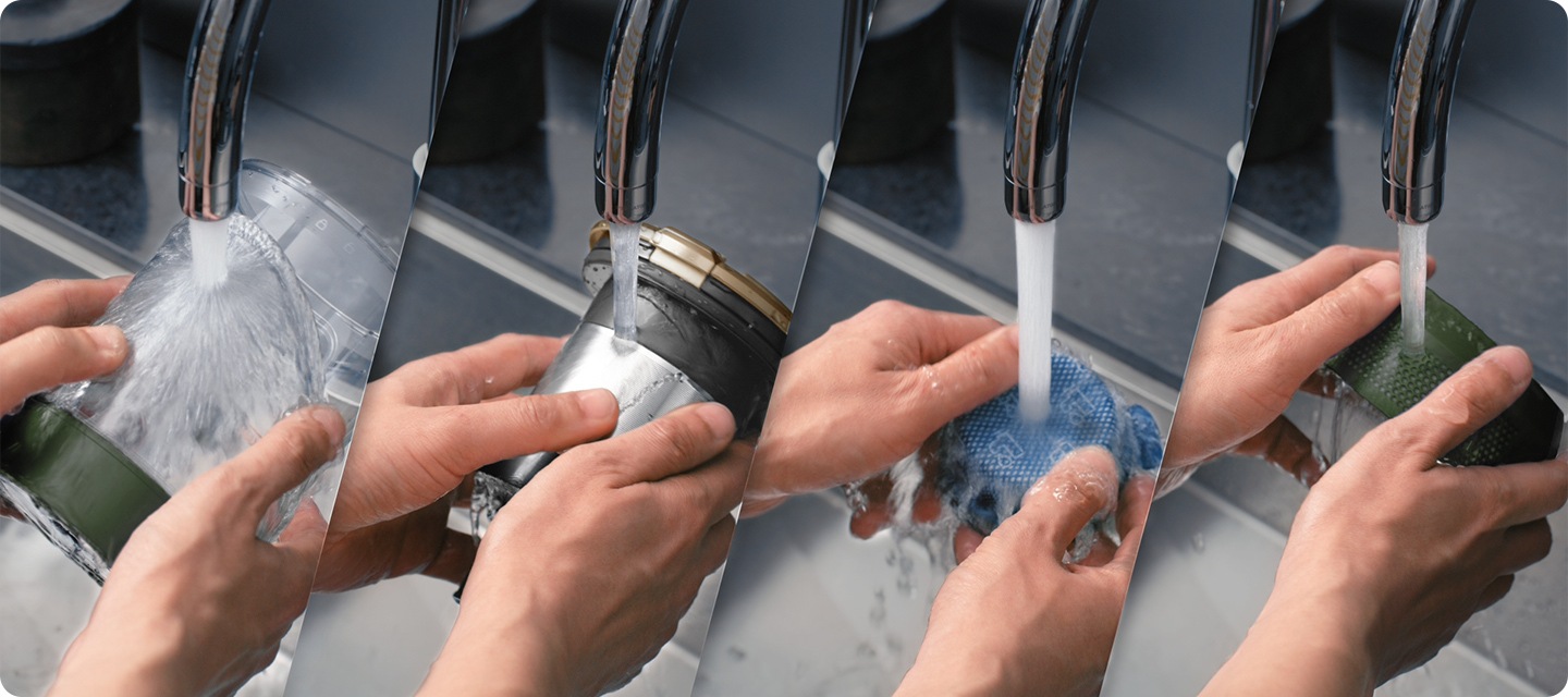 Le 4 parti della pattumiera di un JET su misura vengono lavate a mano sotto l'acqua corrente. Le 4 parti sono la pattumiera, il ciclone, il microfiltro e il filtro per polveri fini.