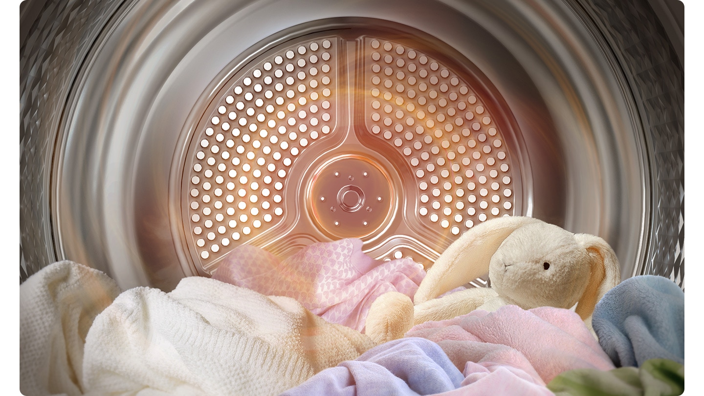 Il calore ad alta temperatura viene emesso dal riscaldatore all'interno del tamburo DV5000B, asciugando vestiti e bambole.