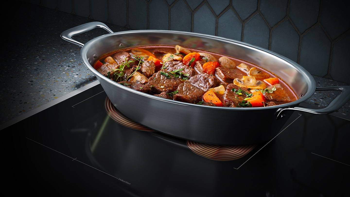 Beef stew is being cooked on the NZ8500BM. It is available to cook with oval shaped pan.