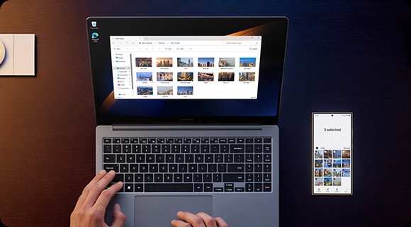 A person is using Galaxy Book4 Ultra and Galaxy S24 Ultra to copy and paste images between the devices using Multi Control.