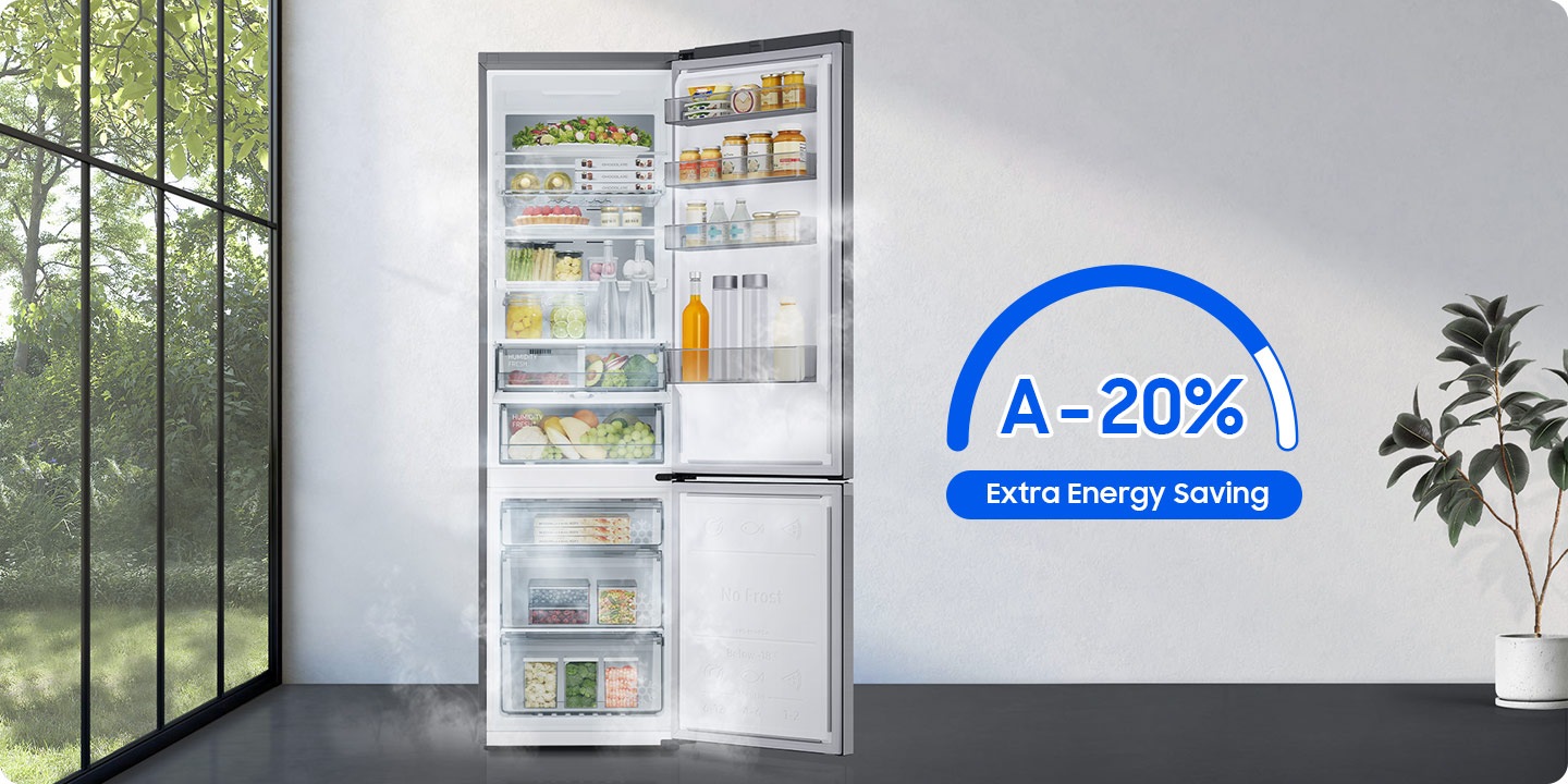 There is a Samsung RB7300 refrigerator in a bright room with large windows. The fridge and freezer doors are open and both are filled with food. A blue energy meter illustration indicates A - 20% for extra energy savings.