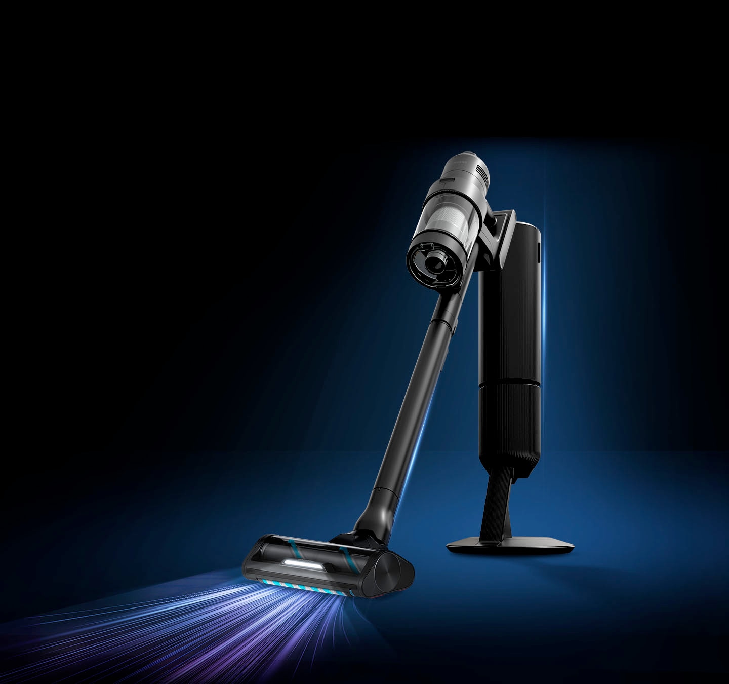 The Clean station and stick of the black stylish Bespoke AI Jet Ultra stand in a dark background, with blue lights visible from behind.