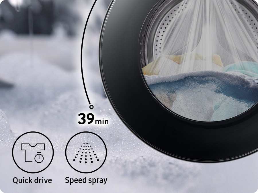 Towels and clothes is in the drum and washing takes 39 min with the powerful speed spray. Quick drive and Speed spray features are shown in icons.