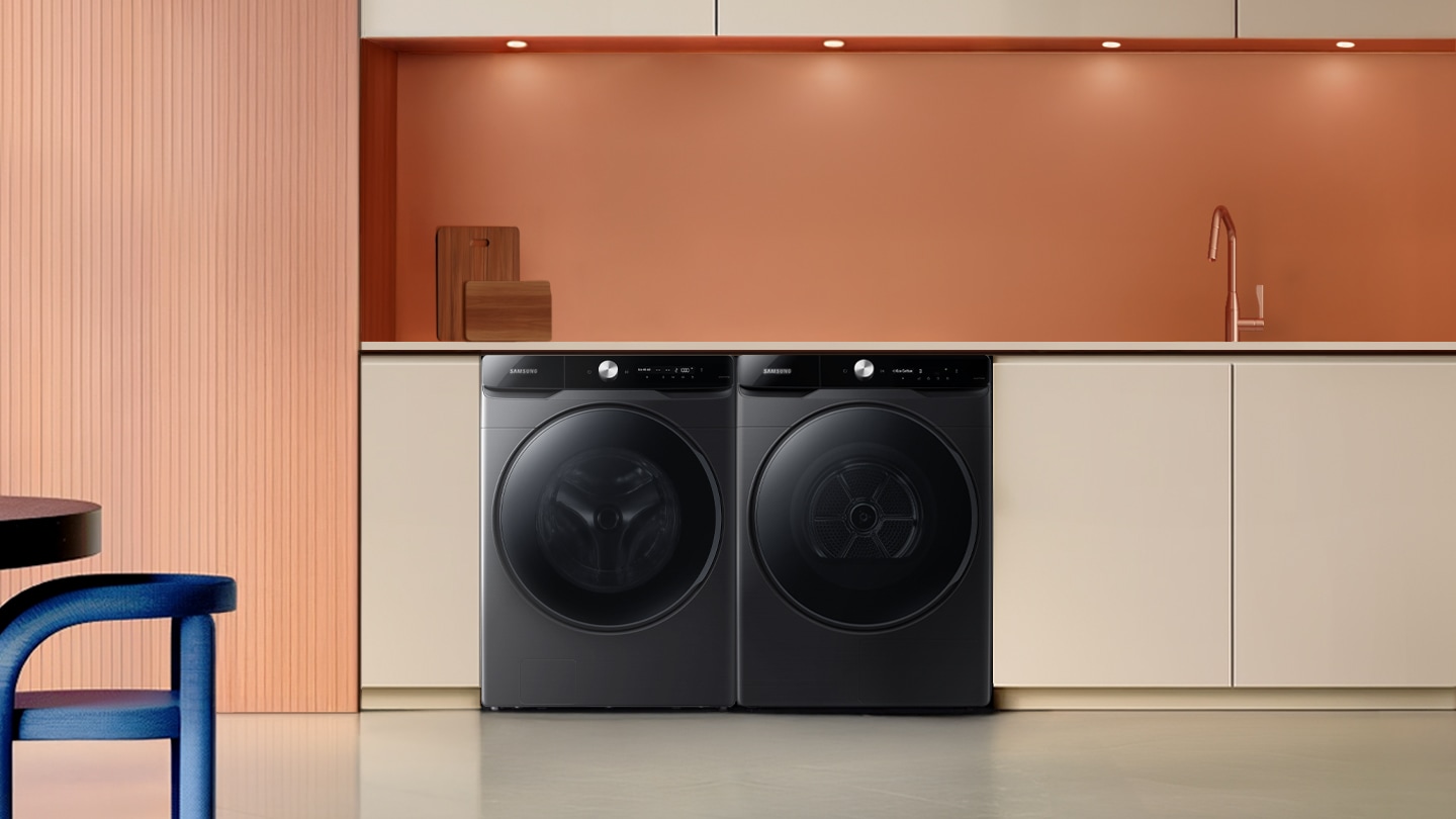 The dryer is installed with a washer in a modern and minimalist laundry room.