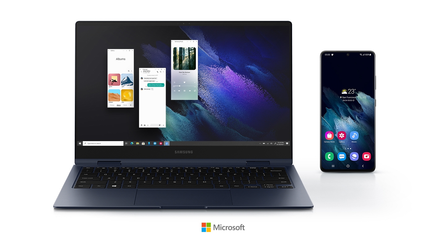 Three Android apps are being run on the Galaxy Book Pro 360 utilizing the Your Phone app. A mobile phone is placed right next to the laptop, showing a display with 7 app icons on it, meaning apps can be operated on laptop without using mobile phone. Microsoft logo placed at the bottom.