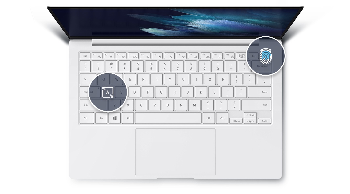 The Galaxy Book Pro's keyboard with a fingerprint icon for secure logins and a wide key icon. Surrounding the touchpad are arrows going outwards to signify the boosted size of touchpad.