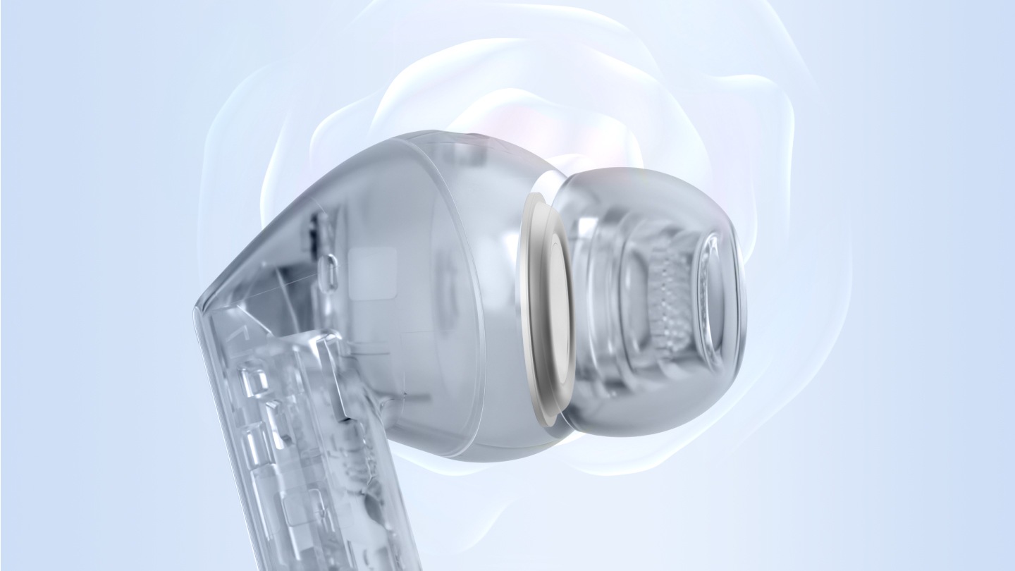 Вид сбоку на прозрачные наушники Galaxy Buds3 FE, открывающий динамик внутри наушника. Galaxy Buds3 FE слегка поворачивается, а внутренний динамик вибрирует, имитируя издаваемый звук, и меняет цвет с прозрачного на черный.