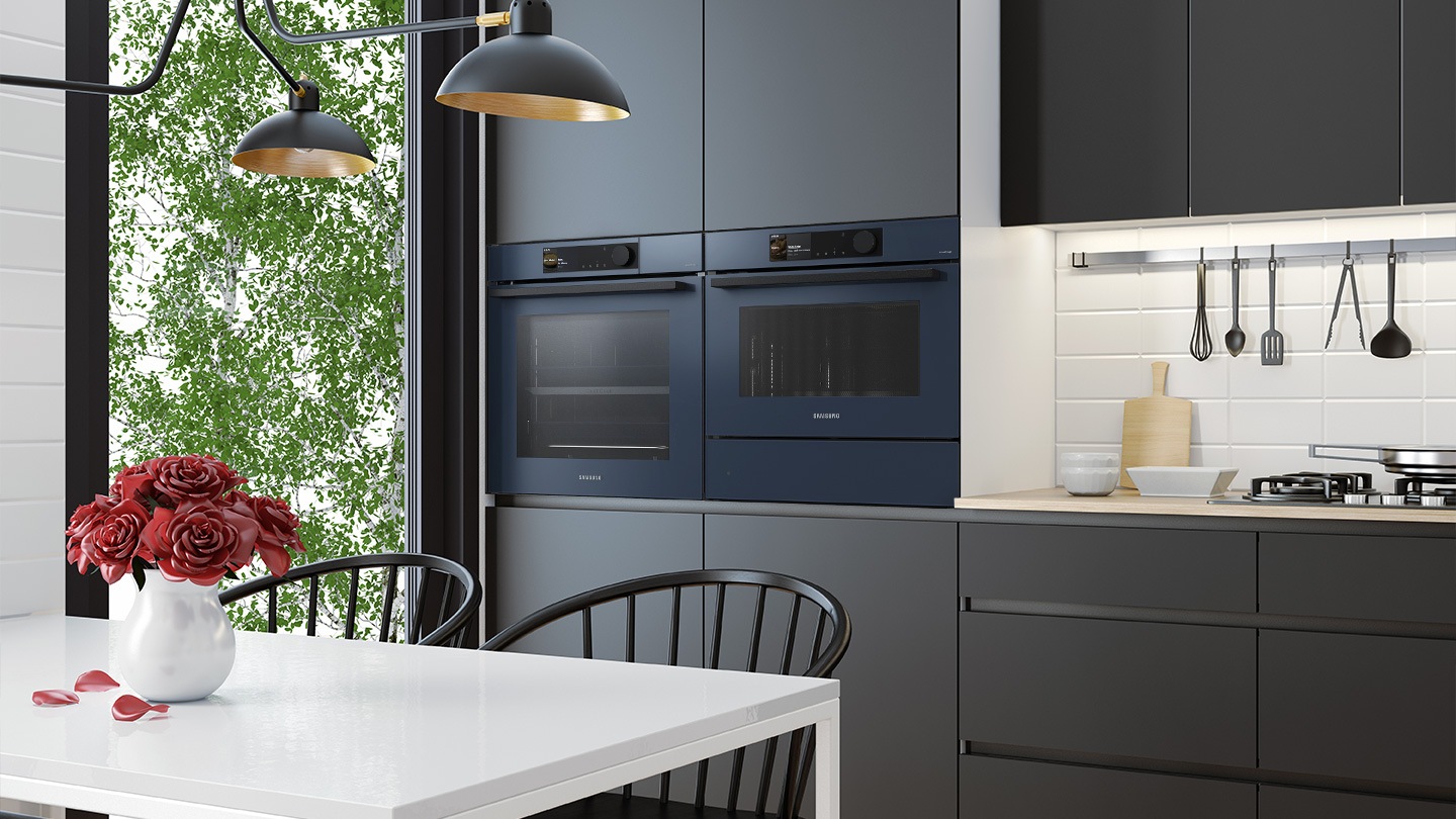 Shows the built-in oven seamlessly installed in a kitchen next to a Microwave Combo oven. Its BESPOKE 
