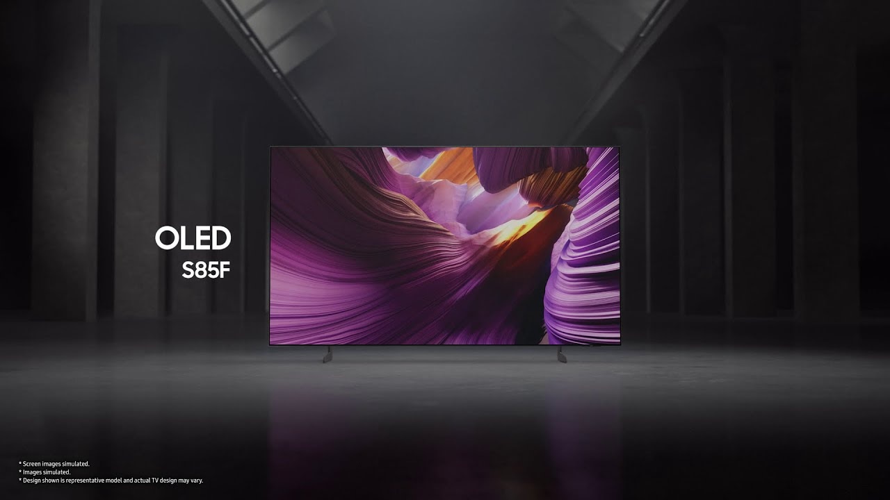 Samsung OLED S85F TV in a black and white indoor space displays a colorful scene of an otherworldly landscape.