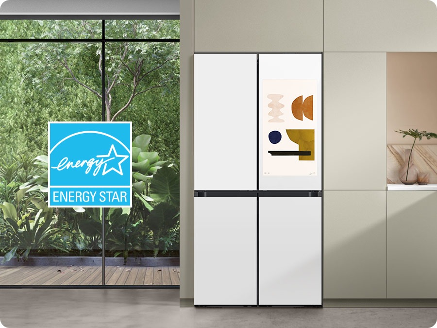 There is a Bespoke refrigerator in a sunlit kitchen. Next to its left is the ENERGY STAR certified seal.