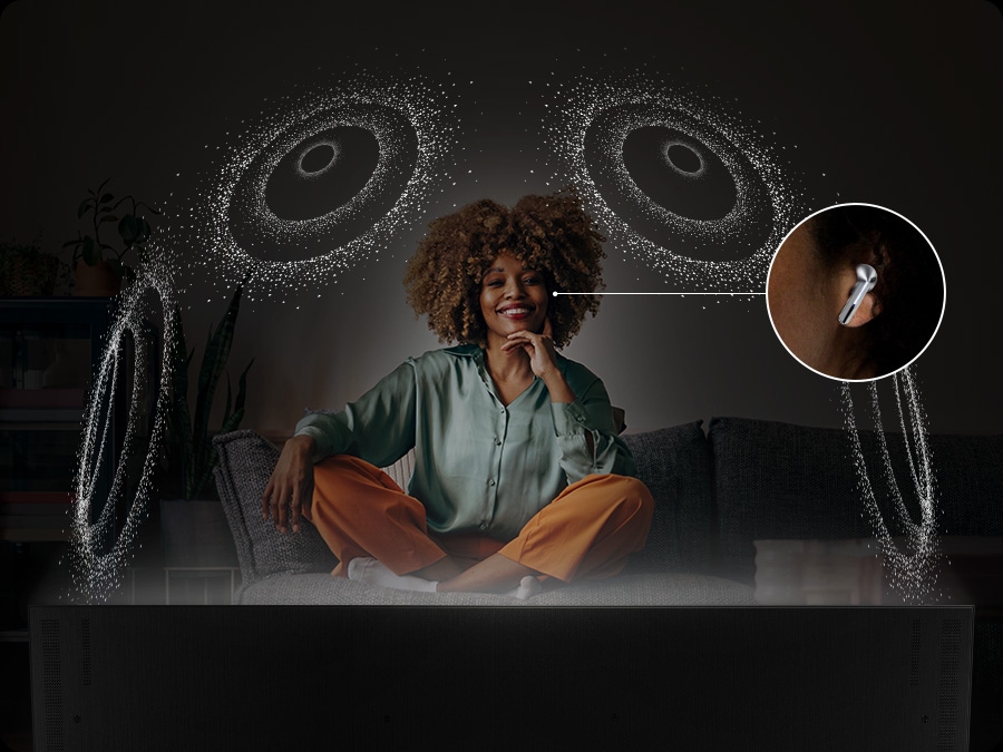 A woman wears Galaxy Buds, which creates a dome of spatial sound that surrounds her.
