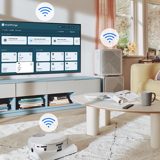 The SmartThings UI is on display on the TV. WiFi icons are floating on top of the TV, vacuum robot and air purifier.