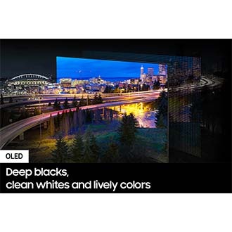 A city lit up by bright lights is on display. The colors and lights are vivid as OLED lights portray through the QD screen.