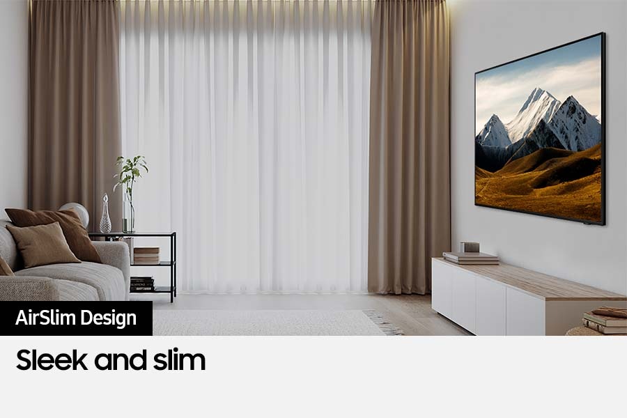 Crystal UHD DU8000 is displaying picture with brown fields and snowy mountains in the living room