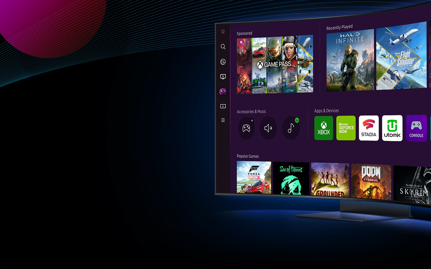 A monitor screen shows gaming hub starting screen with multiple games and apps available to download.