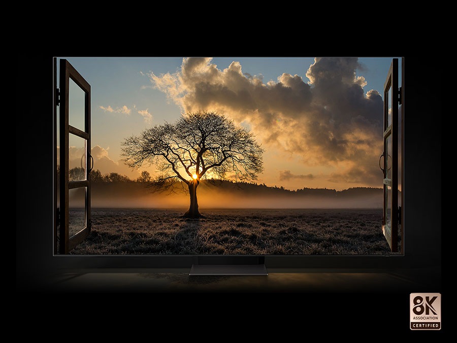 Contrast level of the sunset and a thin tree in a wide field as seen from inside a room is vivid. Neo QLED 8K TV is certified by the 8K Association.