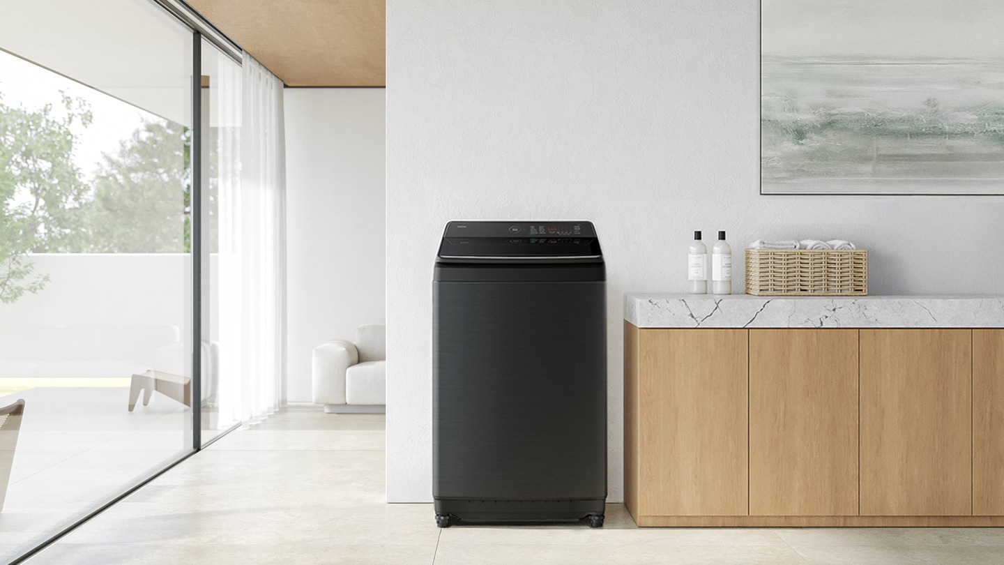 Intelligent washing. The washing machine is installed in the modern laundry room. AI Wash. Intelligent sensing technologies. The see-through interior shows the location of the sensors for water level, wash load, and fabric sensing. Ecobubble™. The BubbleStorm kit is activated and the rich bubbles is created and poured into the drum. This bubble penetrates the fabric up to 2.5x faster. AI Energy Mode. A person is using the SmartThings app on their smartphone and AI Energy Mode is activated. It simply connects and easily control your devices with SmartThings. AI Energy Mode saves up to 20% of energy than existing.