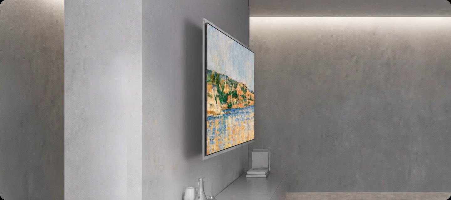 A Samsung OLED TV appears to float before settling flush against the wall. Shown from a side view, the shot transitions to a front view, where the TV displays an impressionist-style coastal landscape.