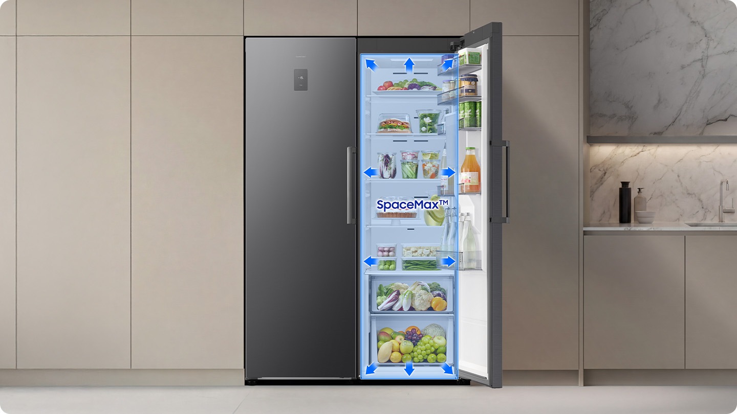The door of the refrigerator is open. Arrows indicate increased internal space, enabled by SpaceMax™ technology.