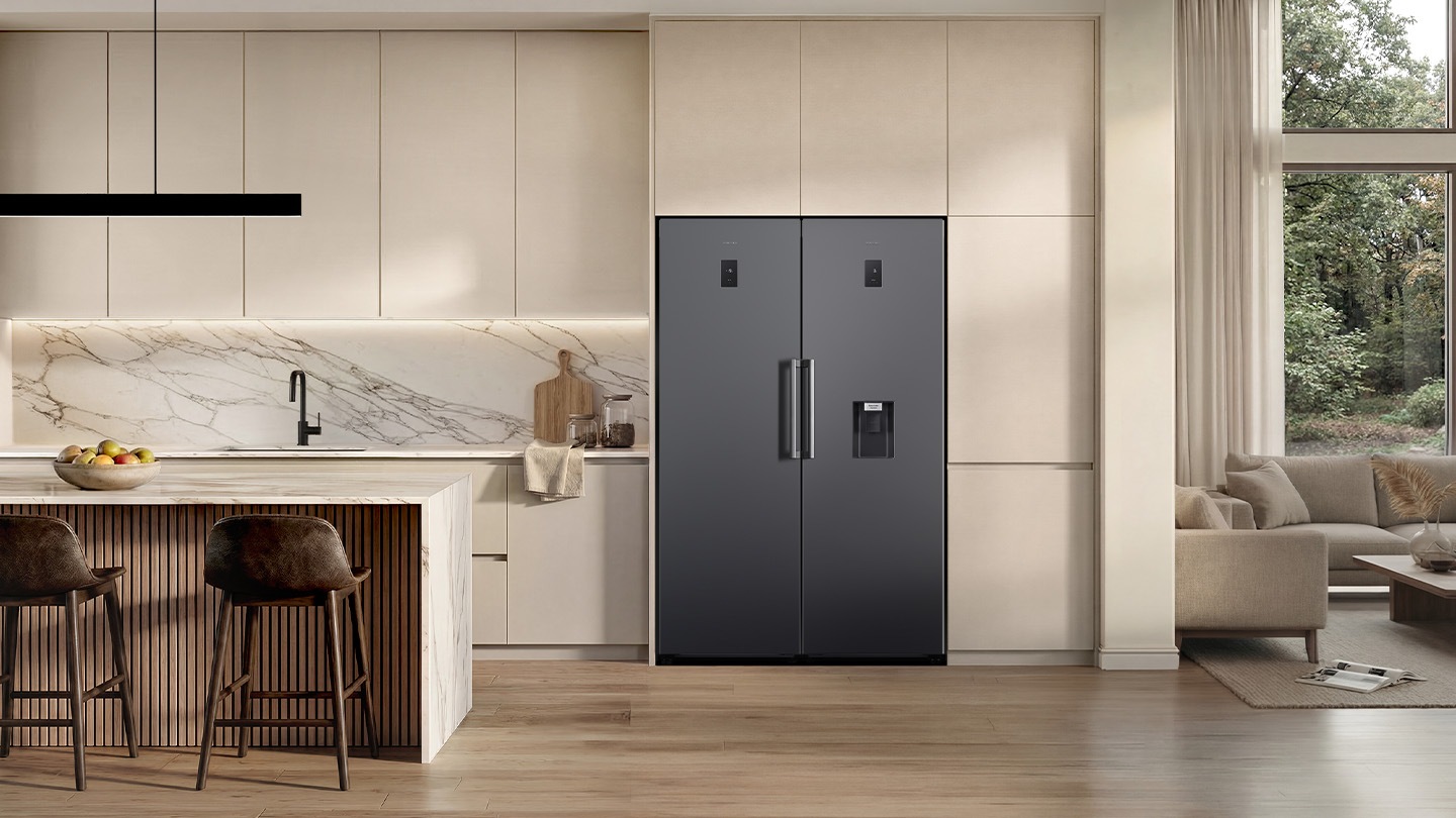 The fridge and freezer set are installed in the Kitchen.