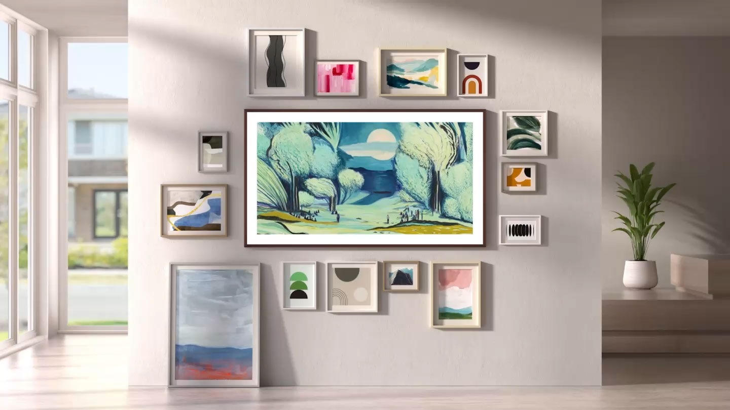 Samsung The Frame TV wall-mounted in a modern home displays artwork, seamlessly blending in with other artworks around it.