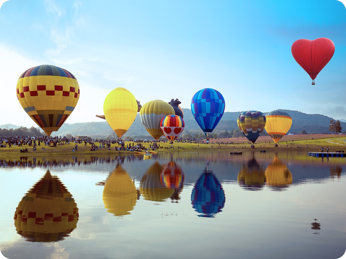 Hot air balloon floating in the sky, with wider background to indicate that Galaxy A12 can capture ultra wide picture