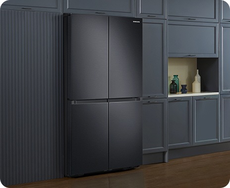 The sleek exterior of the fridge gives a clean look to the modern kitchen, with a flat finish and no recessed handles.