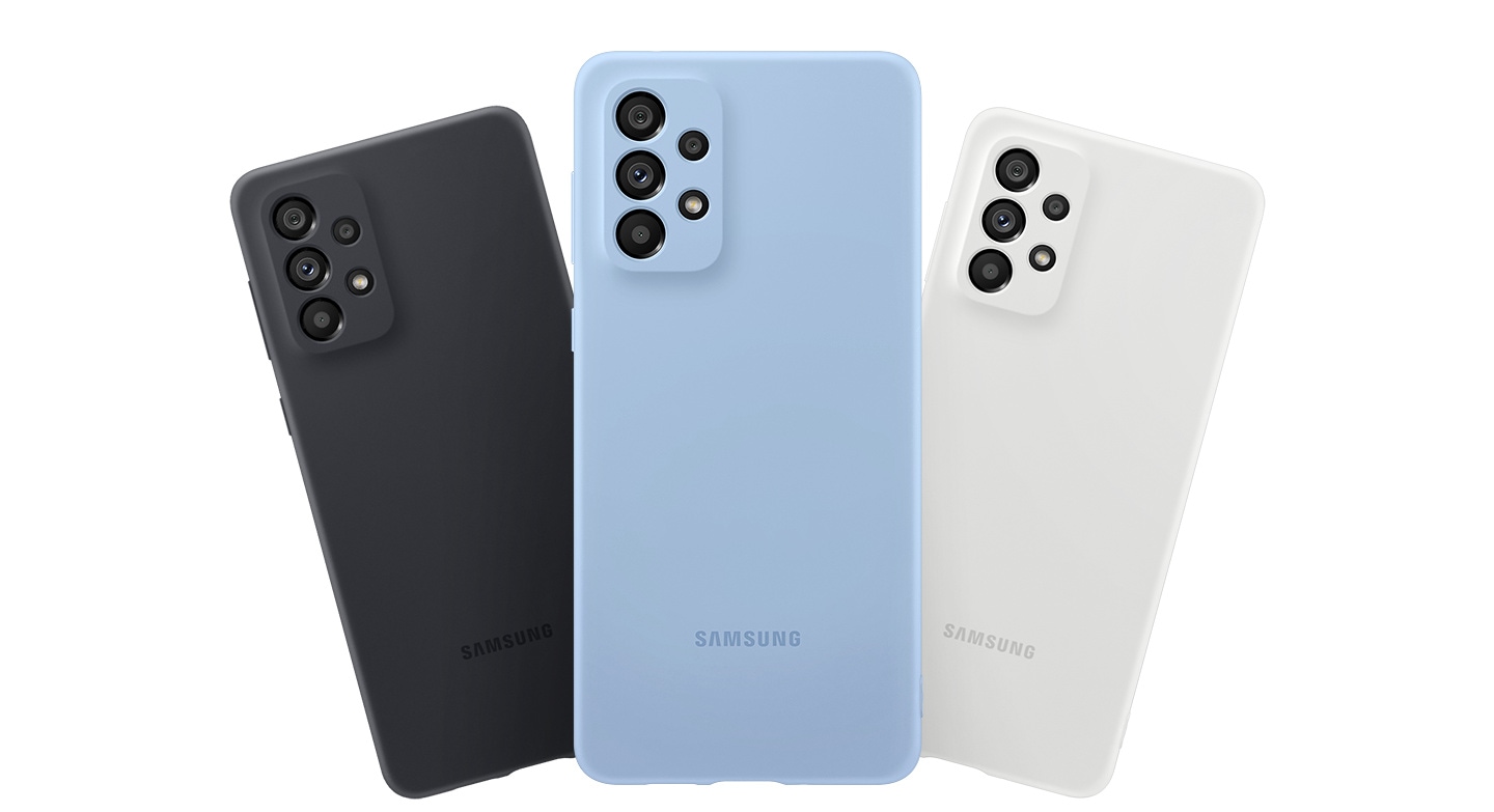 Three Galaxy A73 5G with Silicone Covers fanned out. Three seen from the rear to show the rear camera and Silicone Cover's colors Black, Blue, White.